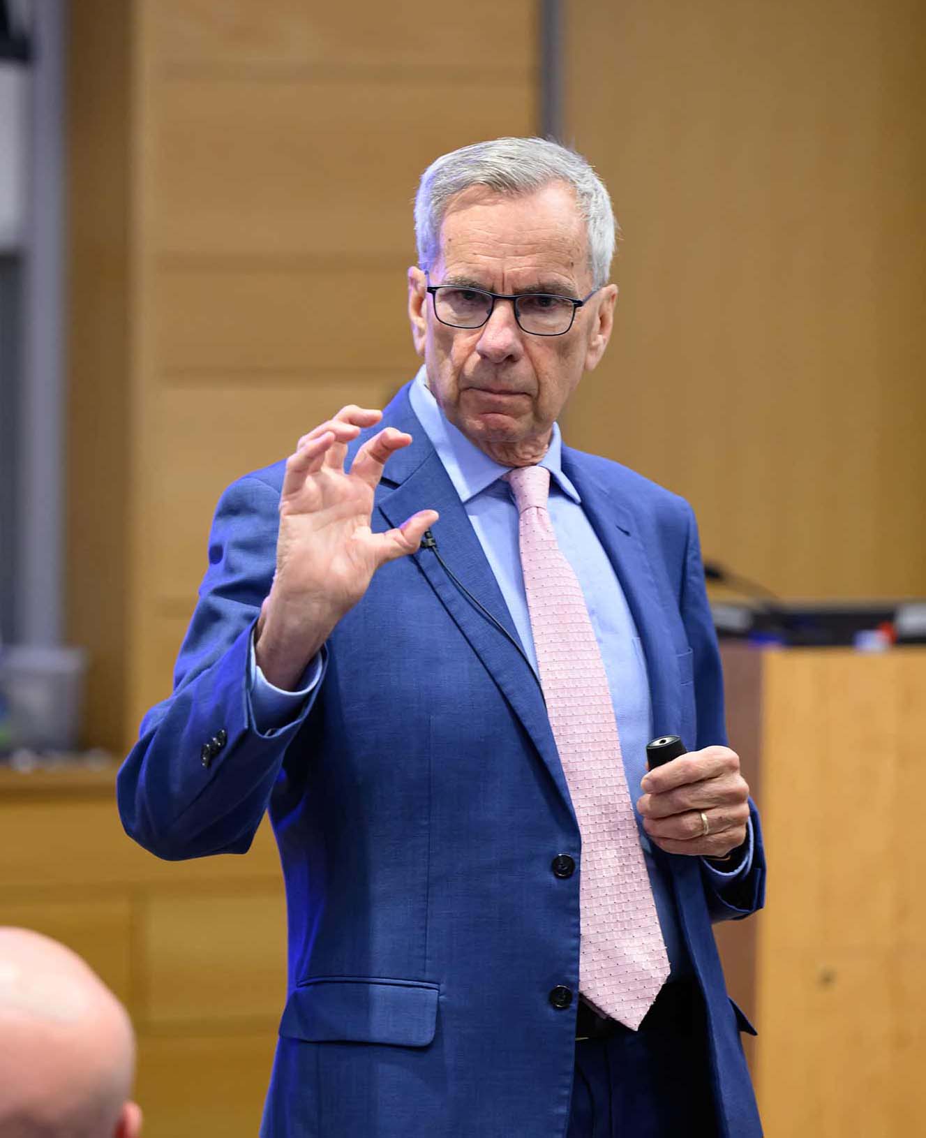 Anthony Pesare speaking at a conference on crime and the mafia